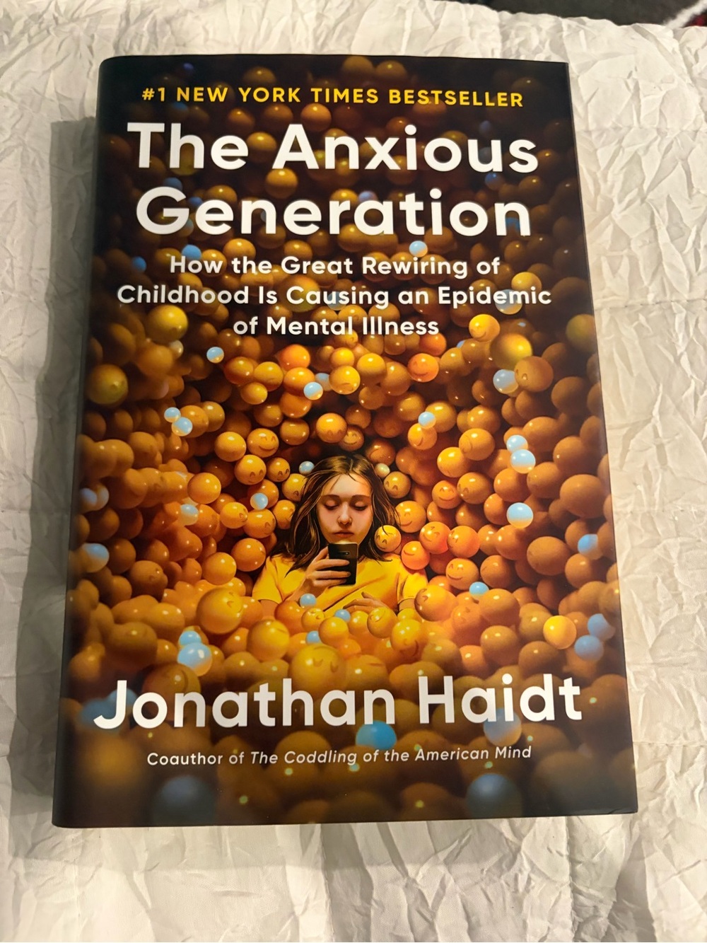 The Anxious Generation by Jonathan Haidt - Yellow & Orange Cover